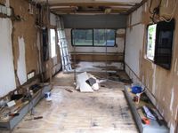 I removed all of the interior lining, something I wouldn't recommend for a sandwich panel caravan knowing what I know now. Old vinyl floor also taken up in strips
