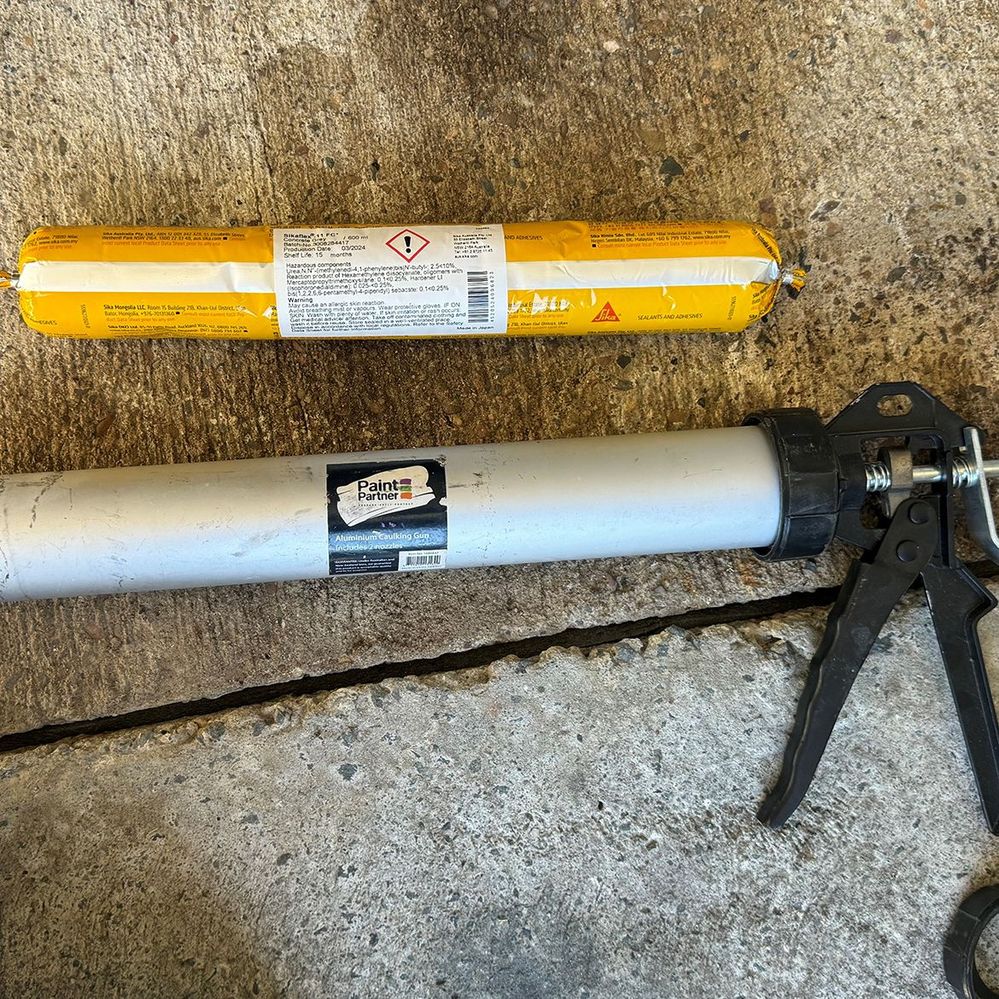 3.1 Caulking gun and Sika 11FC.jpg