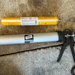 3.1 Caulking gun and Sika 11FC.jpg