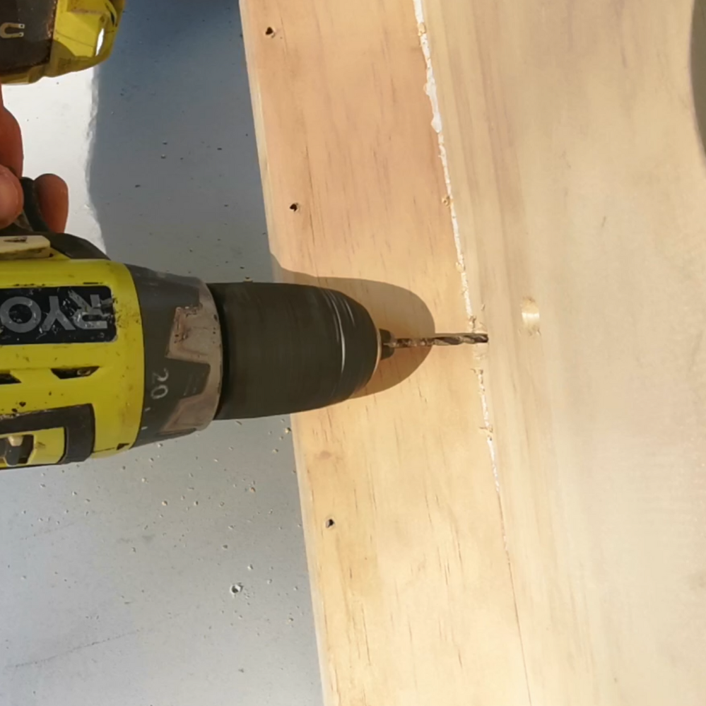 4.2 Drilling holes for stand.png