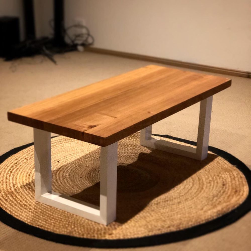 Coffee table top is made from old recycled messmate timber, glued together, with recycled framing timber, painted gloss white