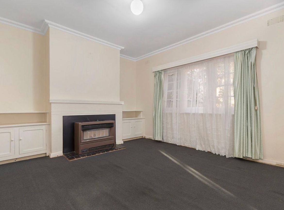 I’d like to add shelves above the built-ins (I have a lot of books!), and replace what’s now a small electric heater with a gas log fireplace.