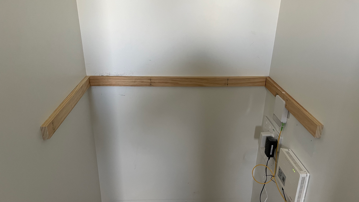 The back support was also nailed into the wall at level. I wasn't too worried about it being flush, just so long as nothing was higher than the side supports.