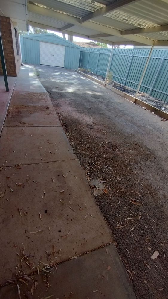 concrete path under the pergola