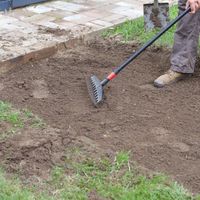 3. Use a mattock or hoe to remove excess soil.jpg