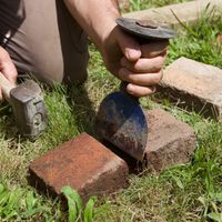 8. Cut bricks with a bolster and lump hammer.jpg