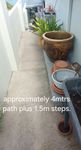 path has a long decline to about 2mtrs from the top to the bottom of steps.Garage ceiling is around 1.2mtrs above the path at the top, and full height at the bottom of the steps.. can park a caravan in the garage.