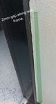 this is the doorway into the garage. There is a gap between both surfaces.