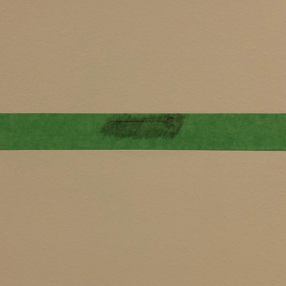 2.3 Attach the tape to the wall.jpg