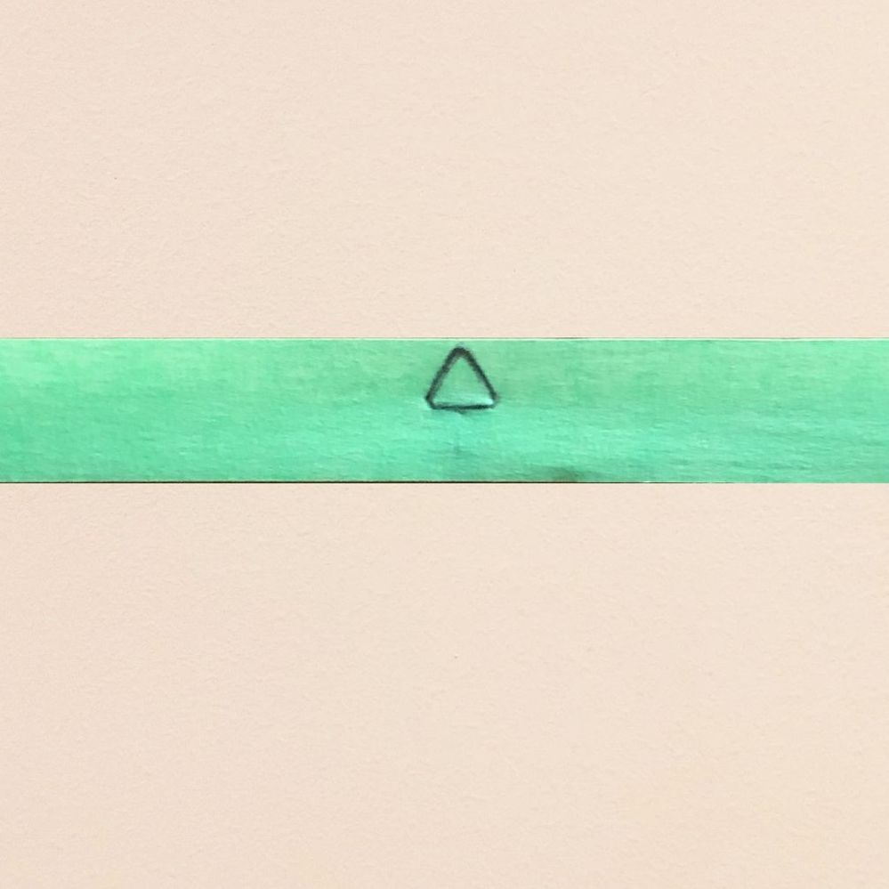 2.6 Attach the tape to the wall.jpg