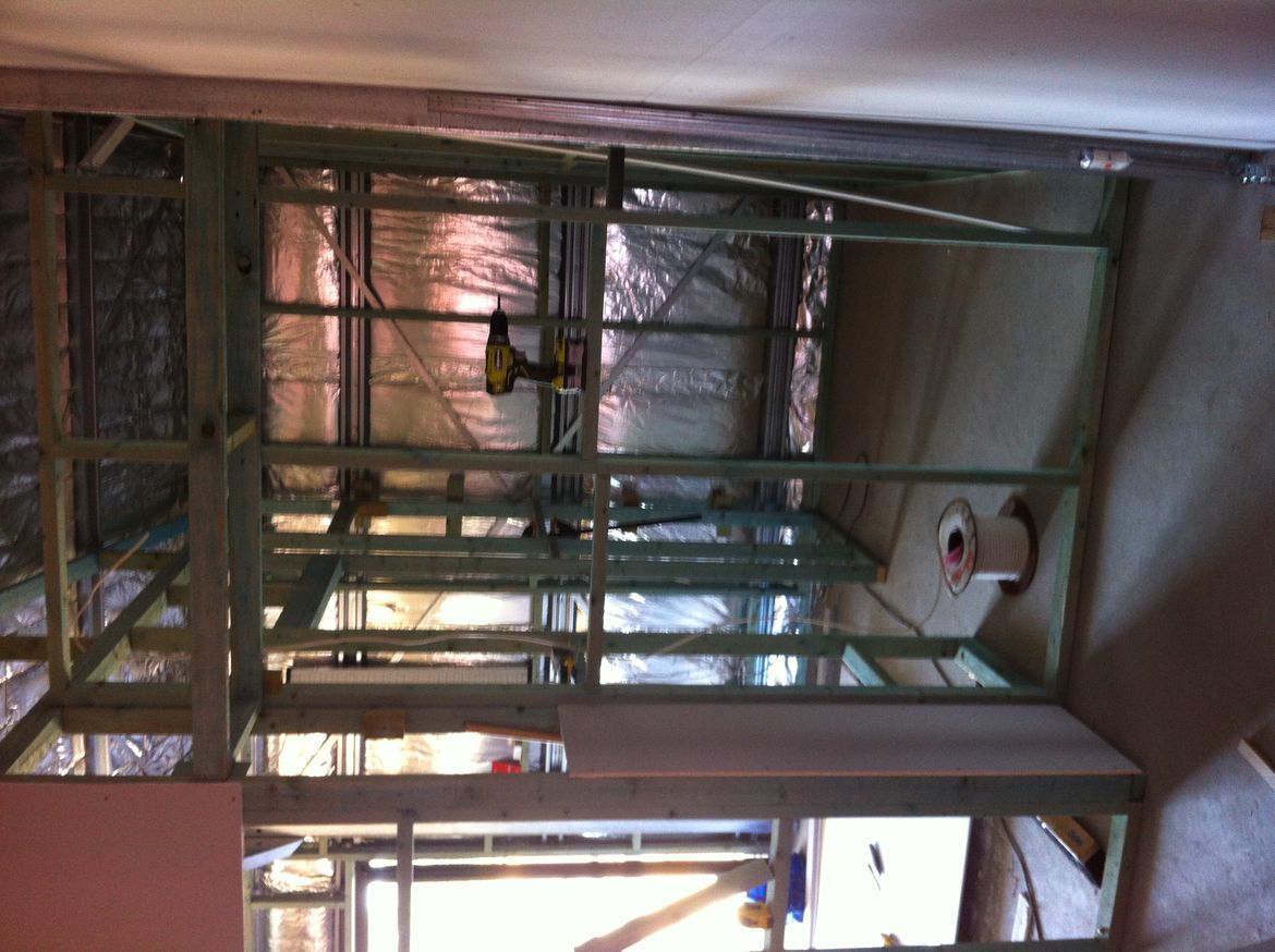 Bedroom robe recess with bathroom behind