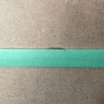 3.3 Attach the tape to the wall.JPG