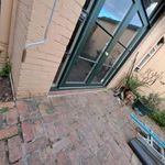 Back door bricks - water getting in under floor.jpeg