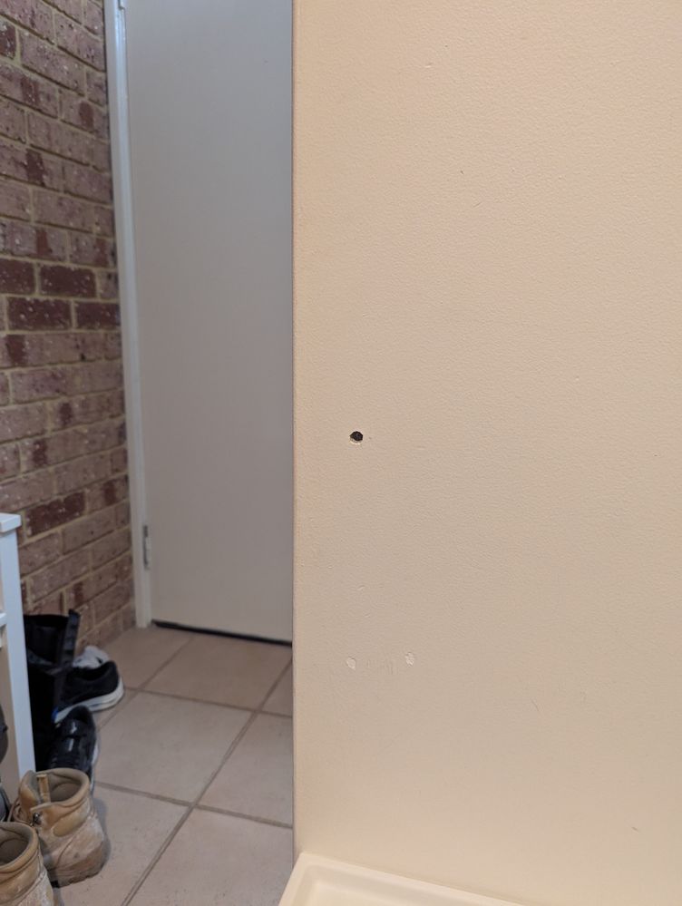Edge of wall with drill hole