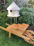 Dovecote and a wooden wheelbarrow.