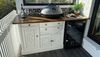 Outdoor kitchen using upcycled cabinet.jpg