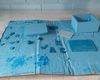 Jack used different shades of blue for the lid pieces and some wooden shapes.
