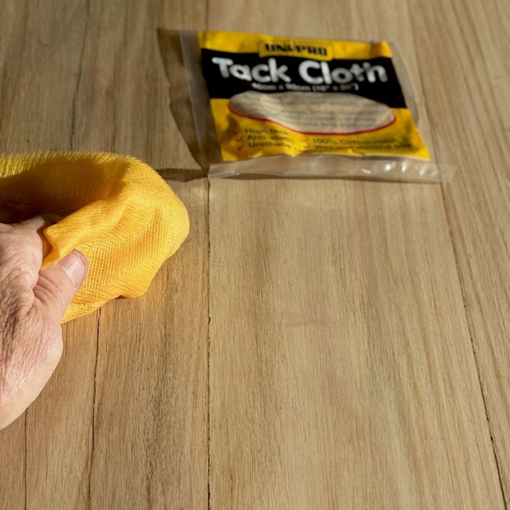 Step 4.2 Removing sawdust using tack cloth.jpg