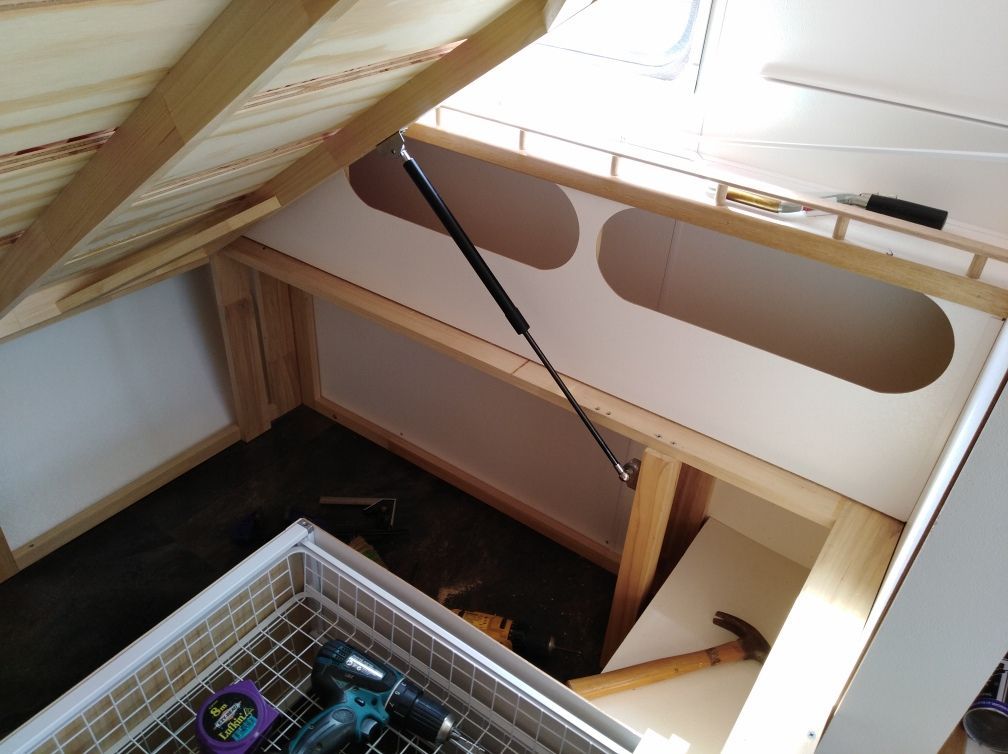 Head board added to use up extra space and provide storage