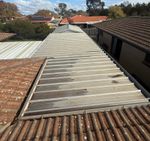 Top view... you can see where the water is gathering. And yes, also gathering in the gutter above.