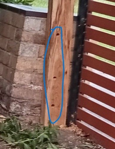 holes in the post for screws.jpg