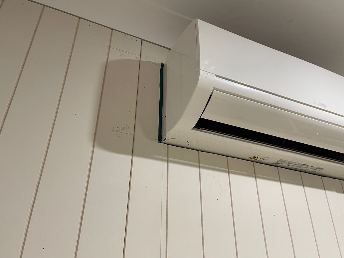 Gap on left side of AC unit.