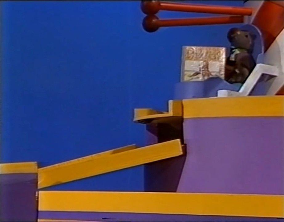 when the trolley comes down this trap thing to go down the slide