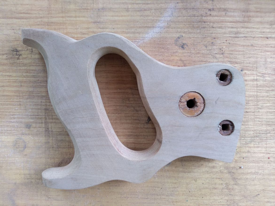 Fortunately my camera for some reason, didn't capture me applying a stain varnish, which dried not to my liking. It also showed I needed to sand with a finer grit as I could still see some sanding marks.  Sanded back the handle again, which came up nicely.