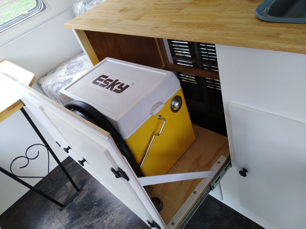 A 35L car fridge will go in here but for now, I've put an esky to demonstrate. I still have to fit off the plumbing, hence the black hose hiding in there.