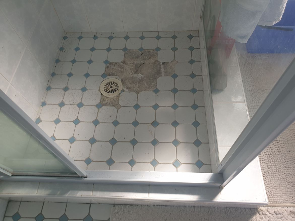 shower floor tiles, water leaking