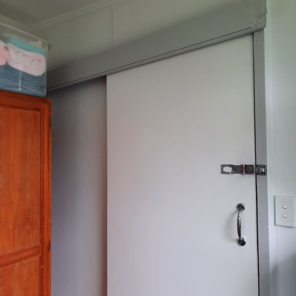 Before with wonky small cupboard