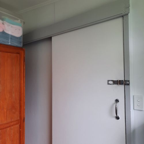 Before with wonky small cupboard