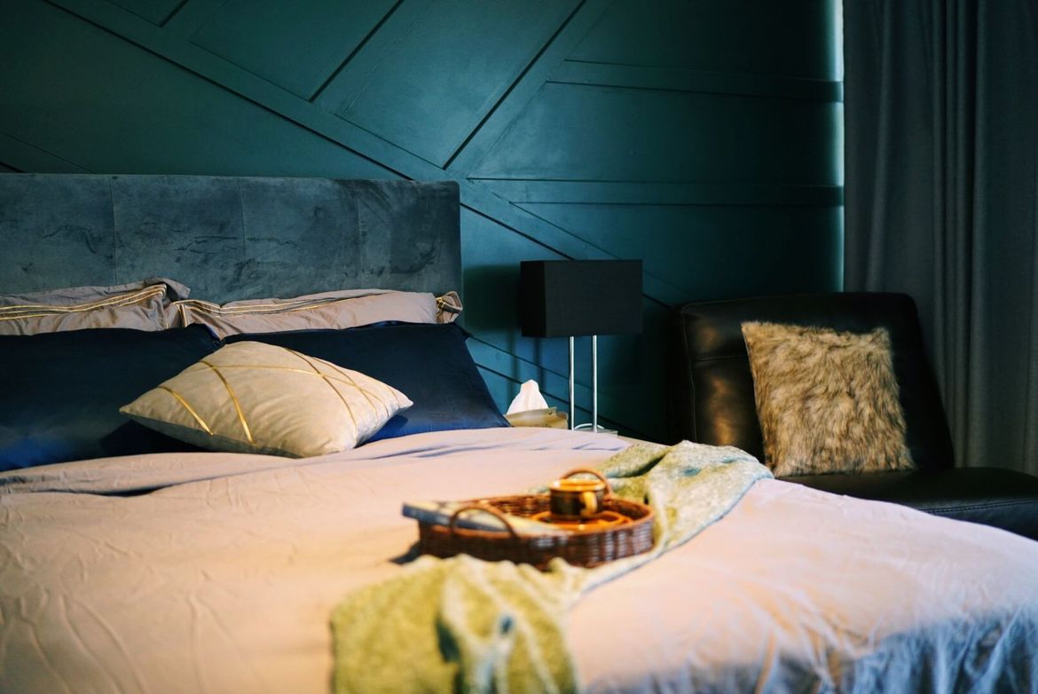 Bedroom feature wall using MDF moulding.JPG