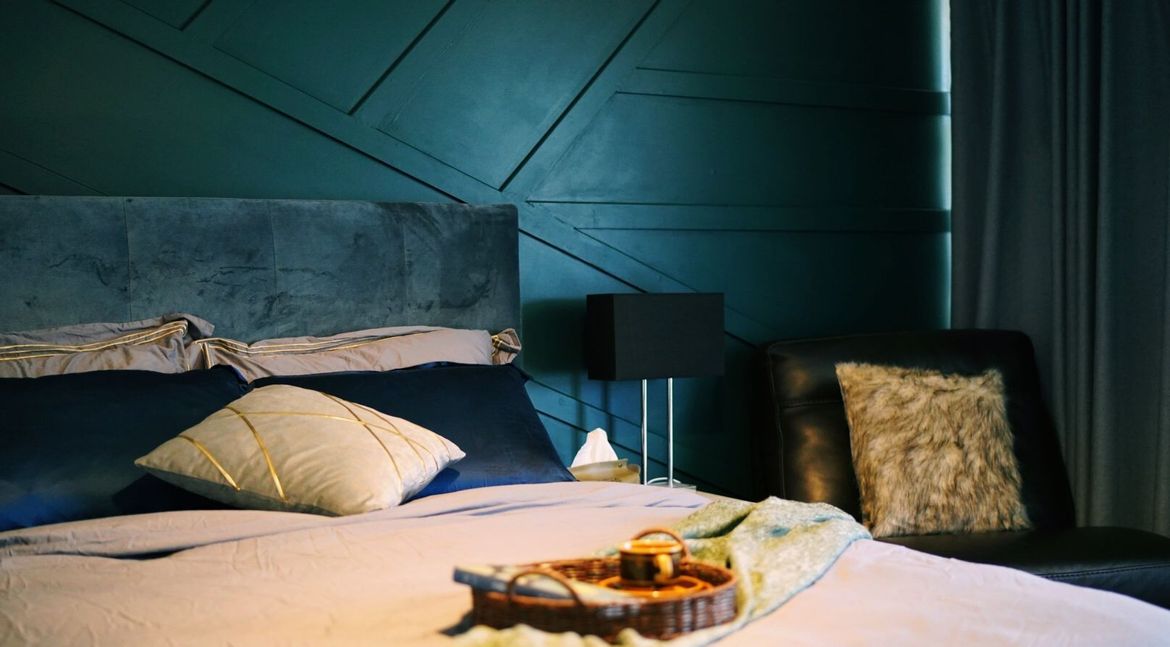 Bedroom feature wall using MDF moulding.JPG