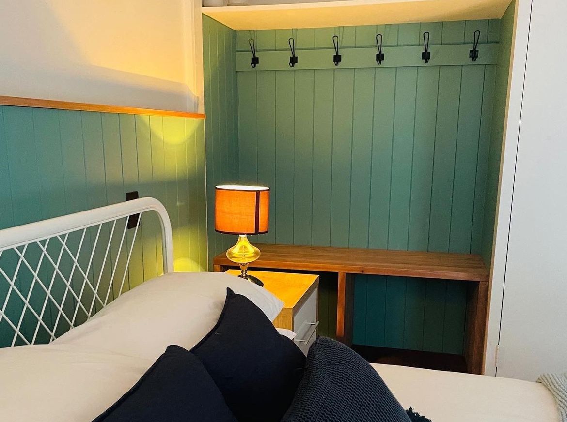 Bedroom renovation with VJ panel mudroom.jpg