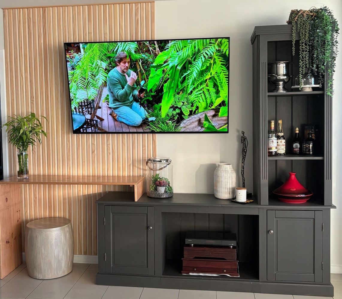 Entertainment unit upcycled for tv wall.jpg