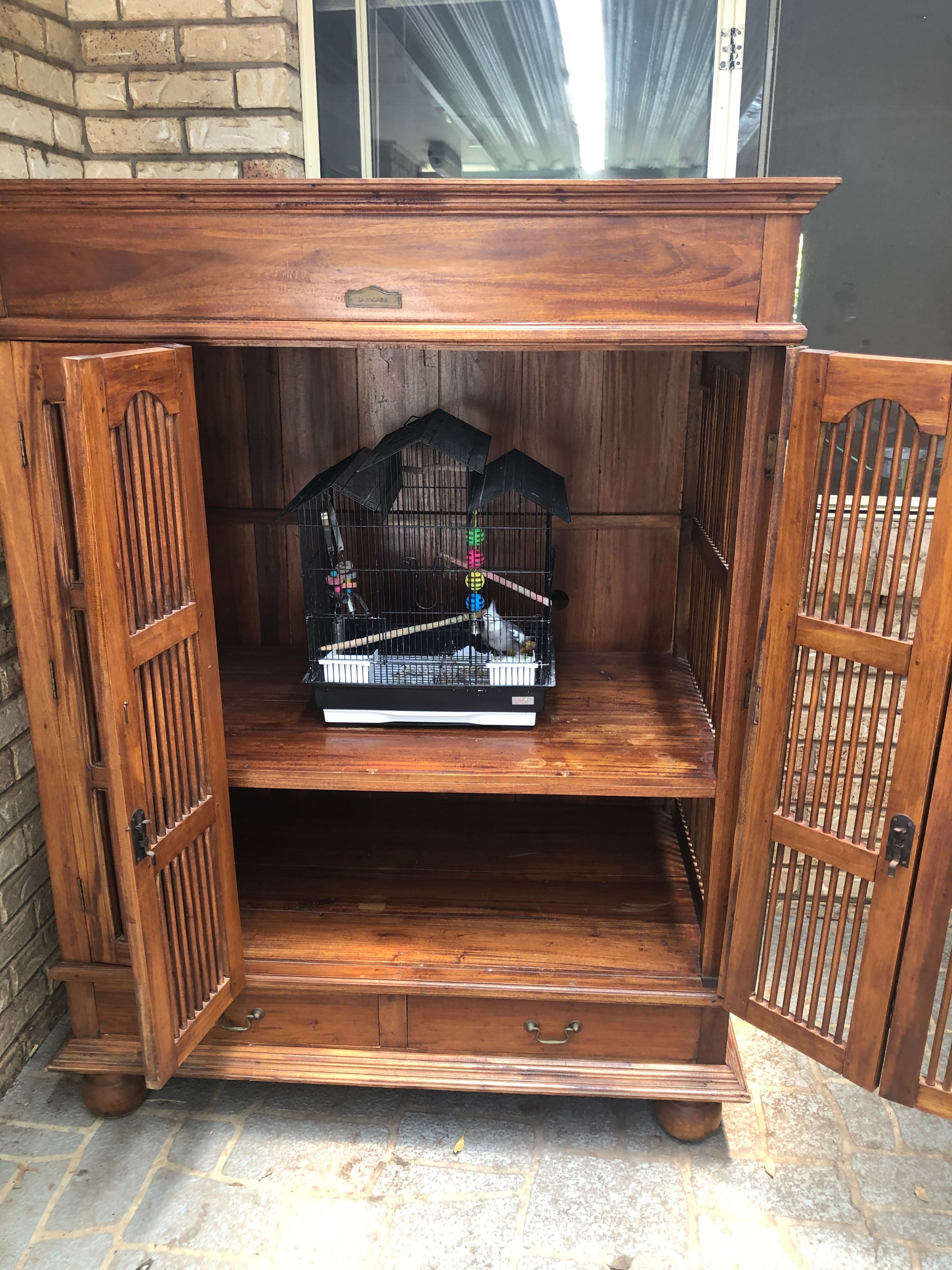 TV unit transformed into bird cage Bunnings community