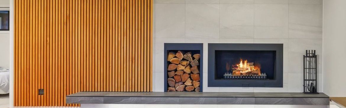 Floating hearth fireplace and timber feature wall.jpeg