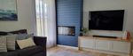 Lounge room makeover using VJ panels.jpg