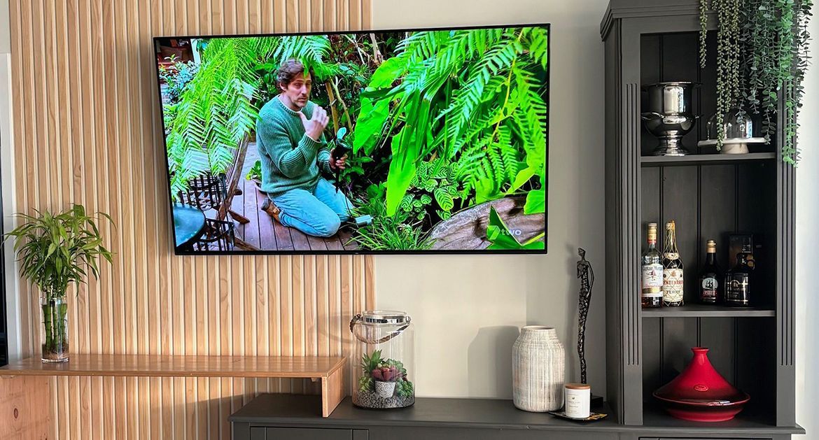 Entertainment unit upcycled for TV wall.jpg