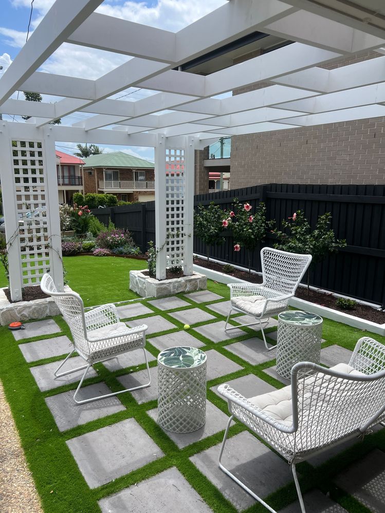 Front yard makeover with arbour and paving.jpeg