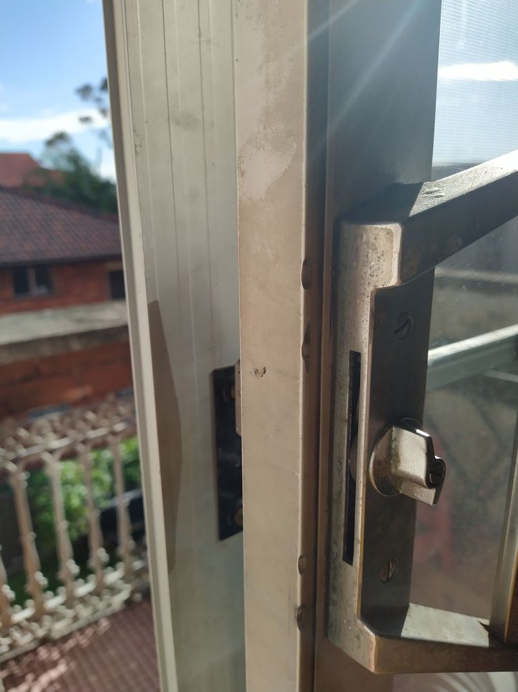 The edge of both main and screen door