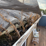 5.7 Cleaning under gutter guard.png