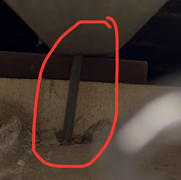 Roof cavity look at the metal thingy that ends abruptly above the lounge room door