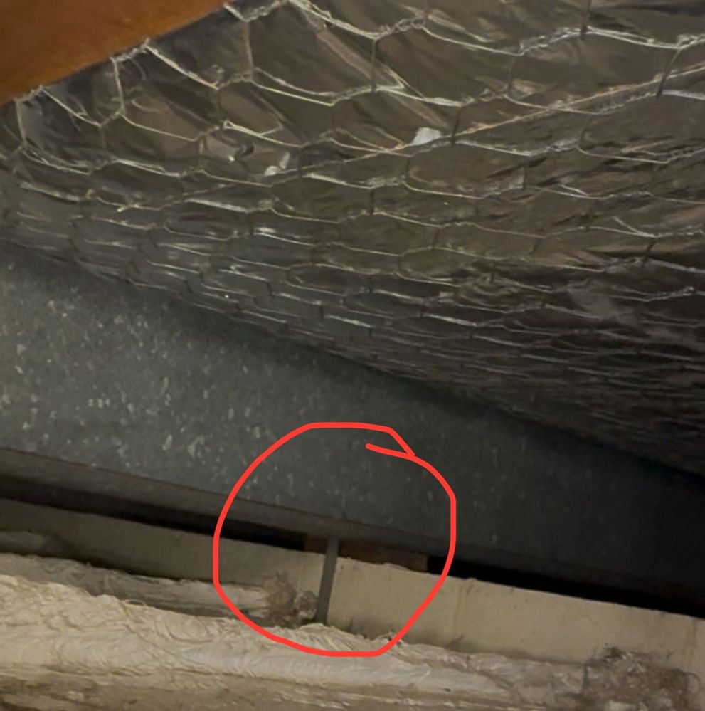 Roof cavity look at the metal thingy that is just left of the door 1 of 2