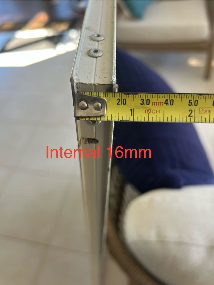 Internal width of aluminum door frame.