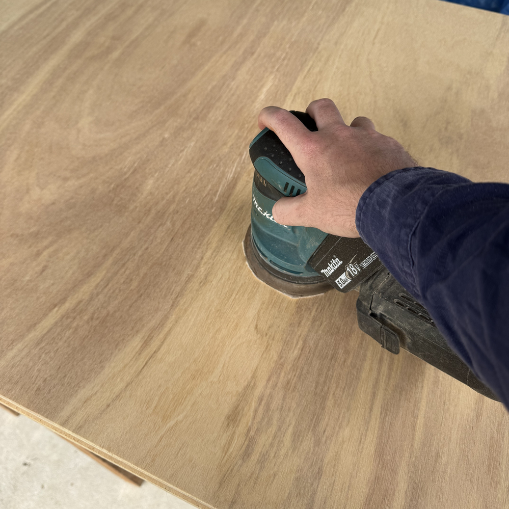 2.1 Sanding timber panels.png