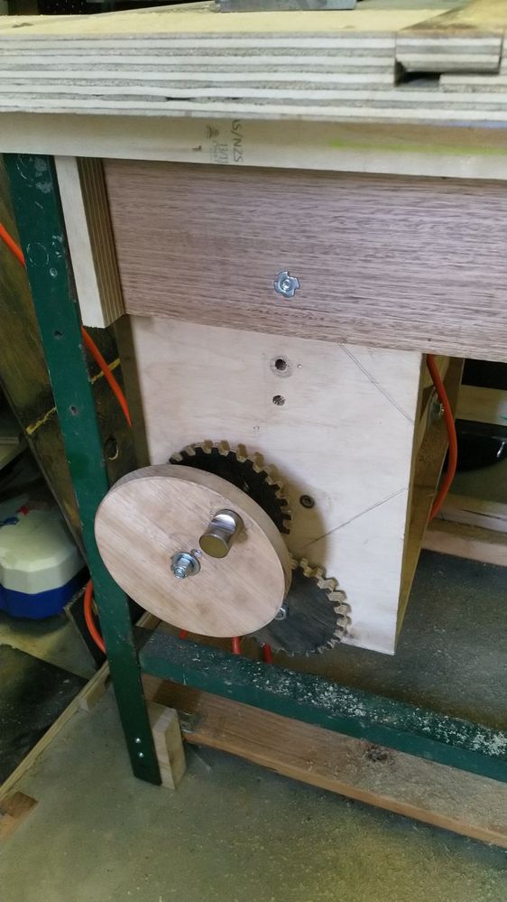Height adjustment was uncomfortably low, so a couple of wood gears bring it up to a better working height