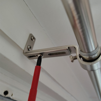 5.3 Lock curtain arm into place.png