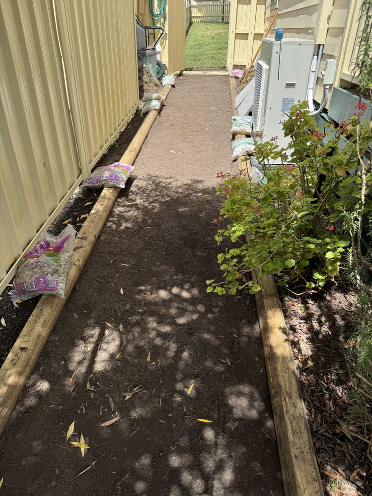 Vegetation removed and sleeper slabs cut and put into place